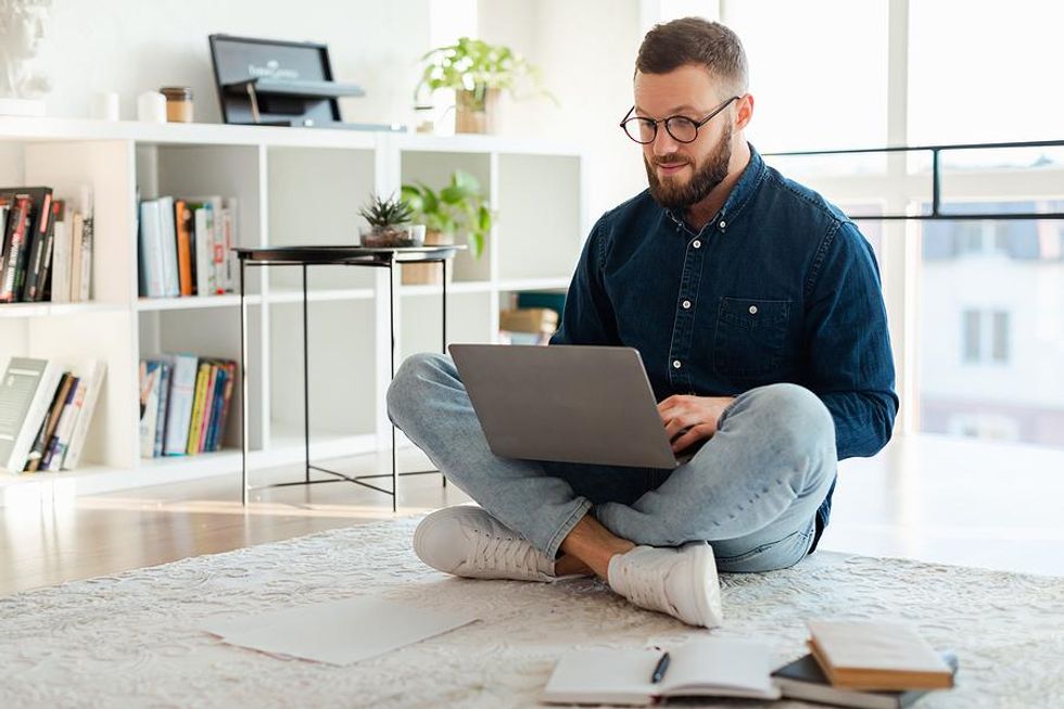 Man checks his resume for mistakes