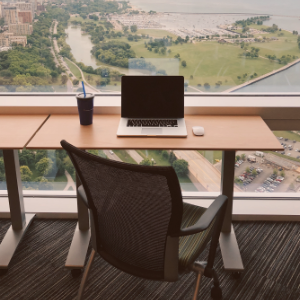 Laptop overlooking view, laptop on standby whilst working through Data Science with Python