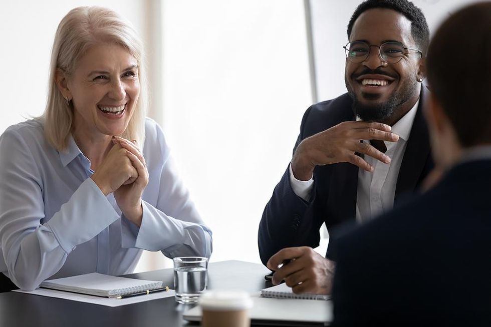 Happy employees have a great day at work