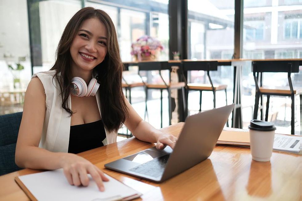 Happy woman looks for a new job