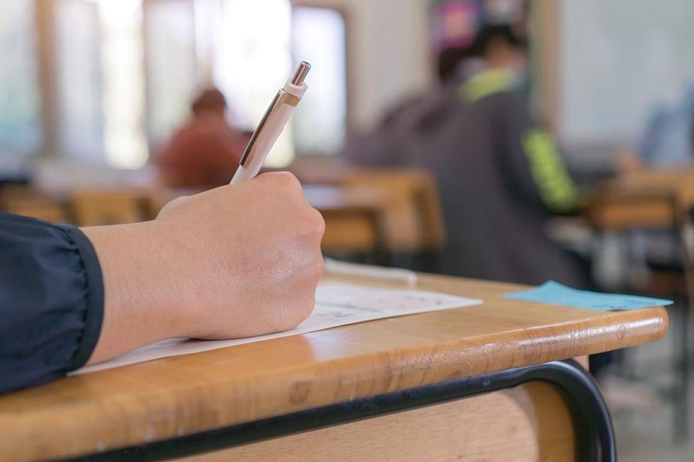 Student takes a test at school