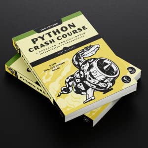 A stack with two copies of Python Crash Course on a black surfacce.