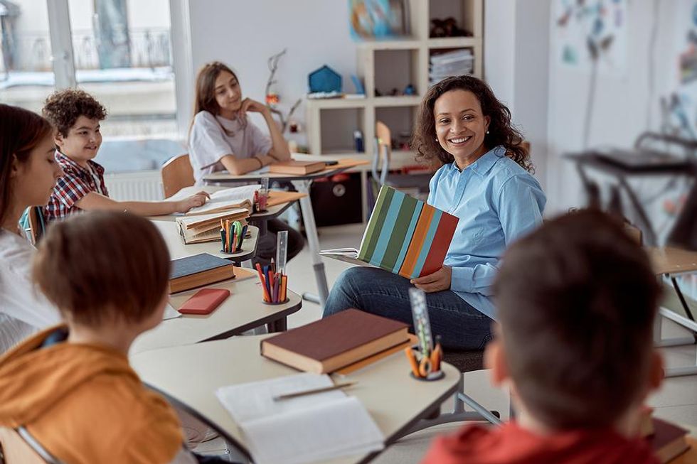 Teacher leads a class discussion