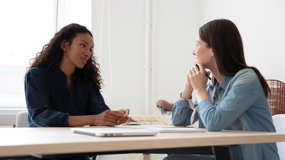 Woman answers a question during a job interview