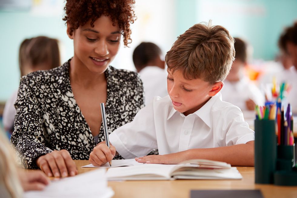 Woman teaches her students