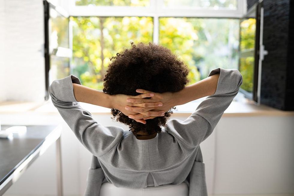 Woman thinking as she looks out window