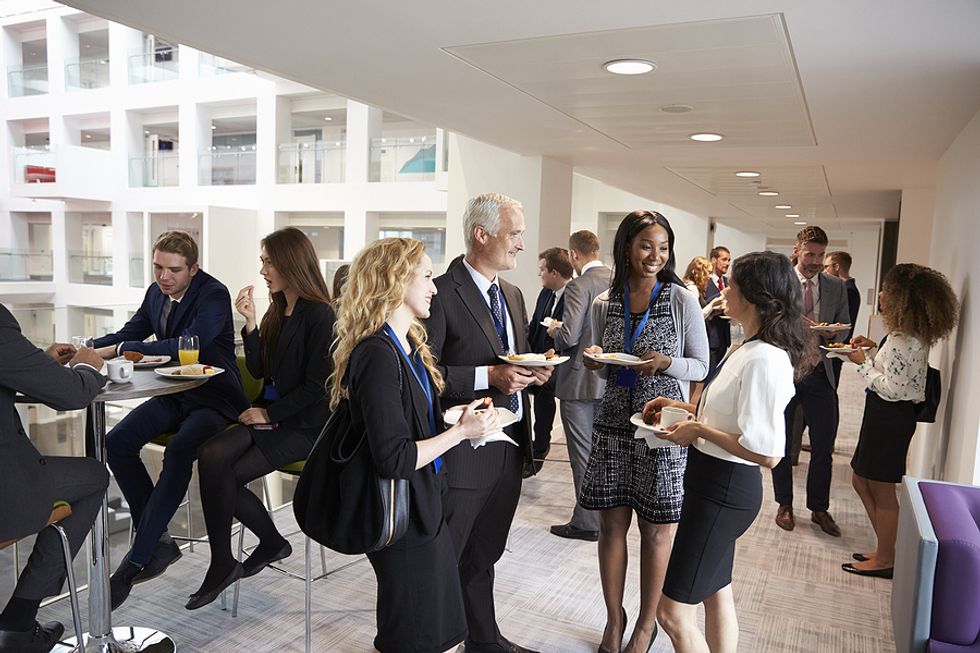 Job seekers network at a conference